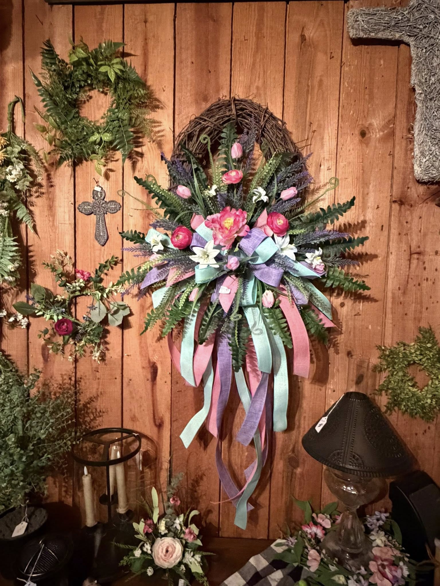 Pastel spring wreath with pink tulips and teal ribbon trails