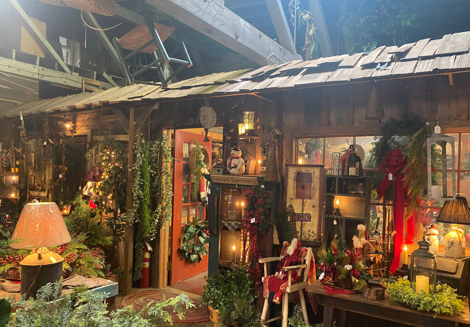 Warm rustic interior of Grandfather's Country Creations decorated for the holidays